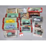 Fourteen boxed diecast Taxi models in 1:43 scale by Vitesse and others.