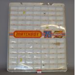 A Matchbox 1-75 'Superfast Rolamatics Streakers' Dealers plastic display case intended for wall