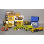 A Good selection of earth-moving and construction equipment by various manufactures,