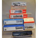 OO gauge. Seven kit built locomotives, mostly with original boxes.