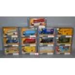 Thirteen boxed Bedford O series diecast models by Corgi including Coach and Pantechnicon vehicles.