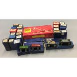 OO gauge. 28 x Hornby Dublo rolling stock. F-G in P-G boxes.