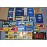 A quantity of boxed diecast models, in a variety of different scales, by Bburago, Corgi and Lledo,