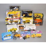 A quantity of boxed 1:50 scale diecast Construction models by various manufacturers including Joal,