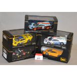 Five IXO diecast McLaren F1 GTR diecast model cars in 1:43 scale including a 1996 Long Tail and