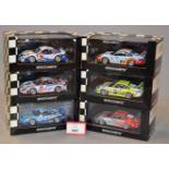 Minichamps. Six Porsche 911 GT3 RSR diecast model cars in 1:43 scale.