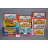 Ten boxed diecast Taxi models, mostly in 1:43 scale, including seven from the Tomica Dandy range,