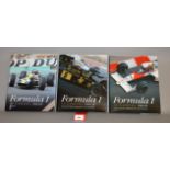 Three Formula 1 racing related hardback books by Quentin Spurring and Paul Parker,