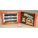 OO gauge. Two Hornby train packs: R332 High Speed Track; R369 BR 3-car DMU Class 110. Boxed, G-VG.