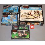 Four Kenner Star Wars Return of the Jedi items: Snowspeeder; Ewok Combat Glider; Speeder Bike;