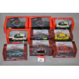 Nine boxed diecast Taxi models in 1:43 scale, including five Abrex Skoda models,