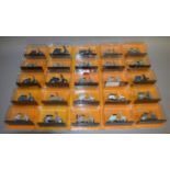 Thirty seven diecast model Vespa Scooters in 1:18 scale, from the Portuguese part work,