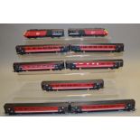 OO gauge. Hornby, Virgin Class 3 'Maiden Voyager'/'Lady in Red' with seven coaches. VG, unboxed.