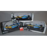 Three Hot Wheels Racing 1:18 scale diecast models: Renault F1 Team R24 Jarno Trulli;