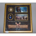 Pirates of the Caribbean Curse of the Black Pearl prop pirate treasure in a frame,