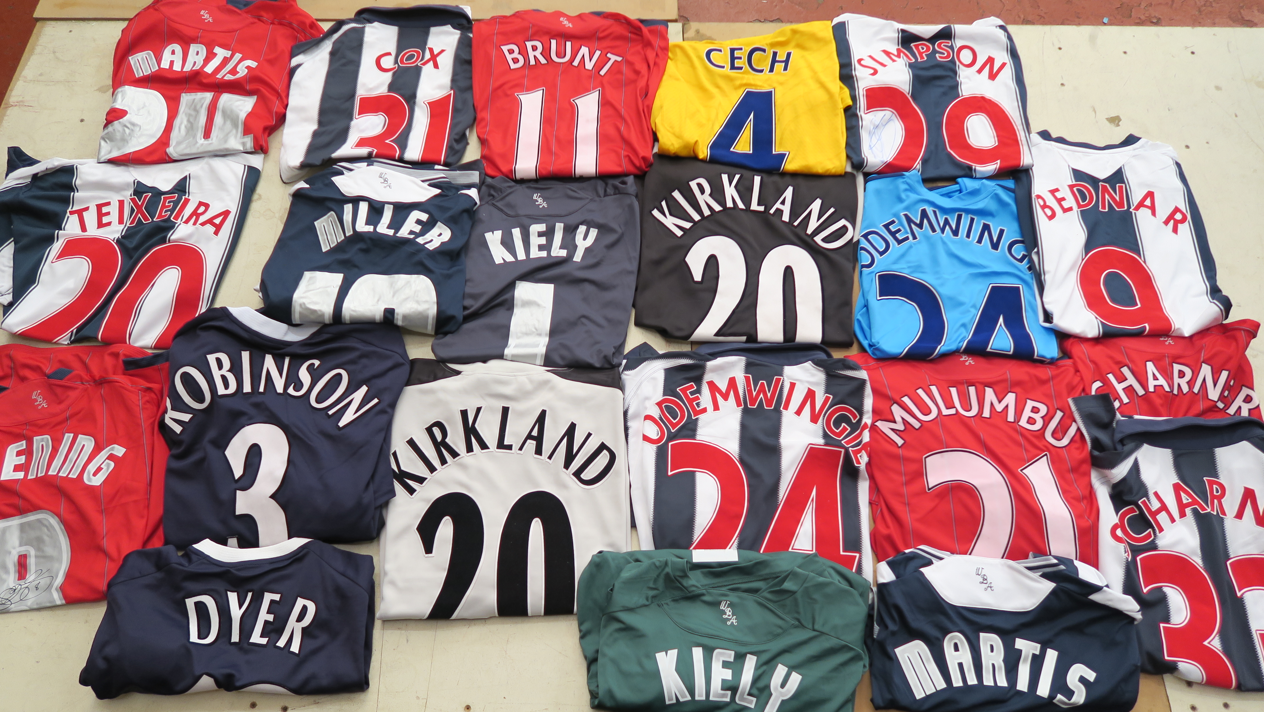 21 West Bromich Albion shirts from seasons 2010 - 2012 signed by Greening & Simpson plus signatures