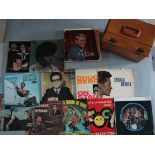 A vinyl LP carry case containing LP records in mostly very good / good condition mainly rock n roll