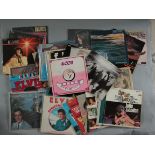 Vintage box full of LP vinyl records including a quantity of Elvis Presley plus others including