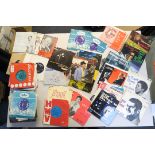 Collection of 7 inch single vinyl records including Buddy Holly on Coral x4,