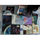 A vinyl carry case containing a collection of LP records in mostly very good / good condition