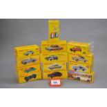 Twelve boxed Atlas Dinky Toys diecast model cars including 24K Simca Vedette 'Chambord',