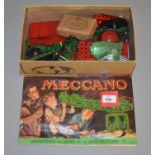 A small quantity of unboxed red and green Mecanno parts including rods, fixings,