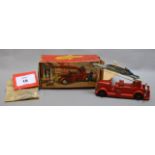 A boxed Crescent Toys diecast model #1221 Fire Engine with Extending Ladder and Climbing Fireman