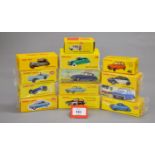 Twelve boxed Atlas Dinky Toys diecast model cars including 540 Opel Kadett,