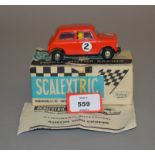 Scalextric C76 Mini Cooper in red with tan interior and racing number 2.