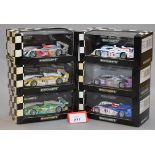 Minichamps. Six Audi R8 diecast model cars in 1:43 scale.