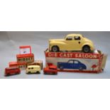 Four boxed Chad Valley diecast models including a large scale clockwork 'Die Cast Saloon' in cream,