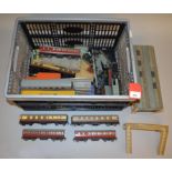 OO gauge. Hornby Dublo, a quantity of unboxed rolling stock with a selection of buildings.