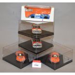 Nine diecast model cars in 1:43 scale including four IXO Ferrari models,