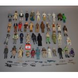 Quantity of Kenner Star Wars 3 3/4" action figures, many with weapons and accessories. F-G. (approx.