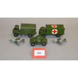 Thirteen unboxed playworn vintage Dinky Toys diecast models including a Trojan Van 'Dunlop',