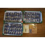 77 x Del Prado Men At War toy soldiers, all in bubble packs and E. Contained in three trays.