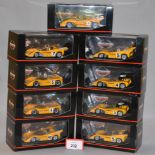 Minichamps. Nine McLaren M8 CanAm diecast model cars in 1:43 scale.