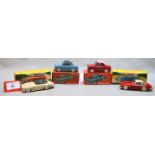 Four boxed Quiralu (France) diecast model cars with two-tone paint work.