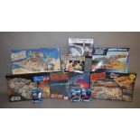 Nine Star Wars plastic model kits by AMT and similar, including Rebel Base.