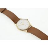 A 9ct GARRARD gents wristwatch, manual-wind 17 jewel movement , on a tan leather strap,