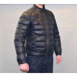 POLICE > A Prada down jacket, size 54.