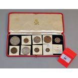 A cased specimen set of 1936 Wreath crown to 1/4d (9coins), lacks manual set,