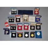 A boxed quantity of cased silver proof coins including 1986 Commonwealth £2, 1992 10 pence 2-coin,