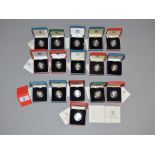 Sixteen cased Royal Mint proof silver £1 coins (with certificates) 1980's & 1990's (16)