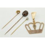 Three various stick pins together with a diamond set crown pendant, approx gross weight 10.