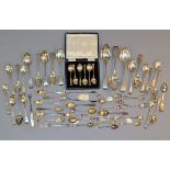 A boxed quantity of silver flatware including Georgian tablespoon,