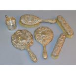 Five pieces of silver backed dressing table ware, various H/M,