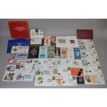 A boxed quantity to include coin set covers, 1780 Maria Theresa, 2008 uncirculated coin collection,