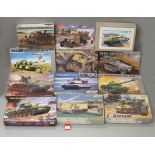 Twelve boxed military related model kits by Dragon and Trumpeter,