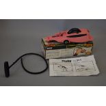 A boxed Dinky Toys 354 diecast model of the Pink Panther's Car,